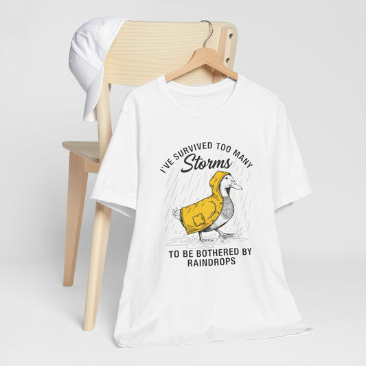 Survivor Duck Tee – "I've Survived Too Many Storms to Be Bothered by Raindrops" Inspirational Graphic T-Shirt
